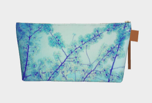 blue makeup bag with blossoms